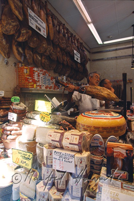 butcher with hams