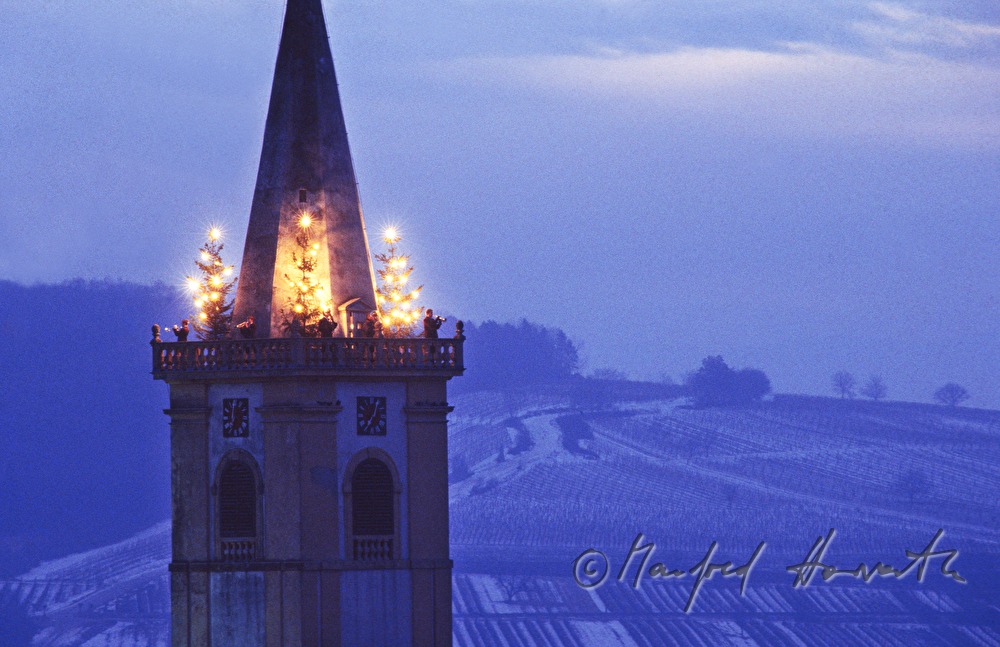 horn players on the steeple