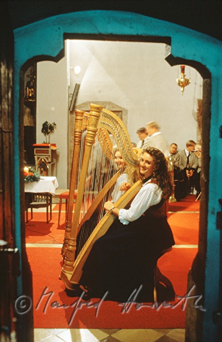 harp players in the church