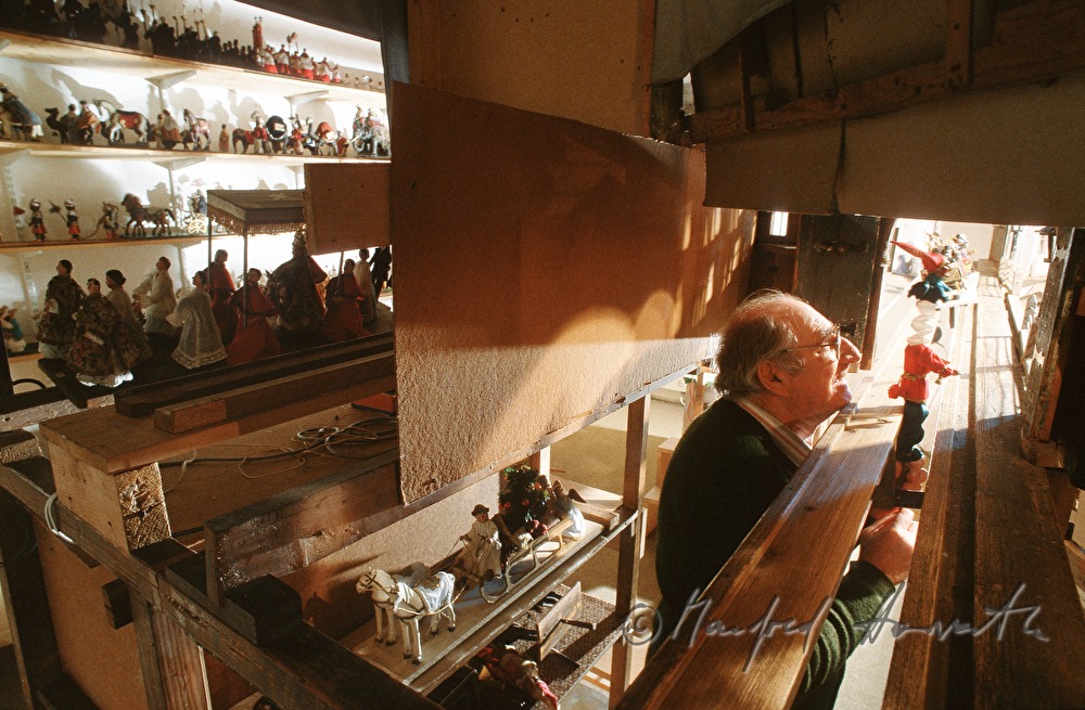 puppet artist behind the curtain
