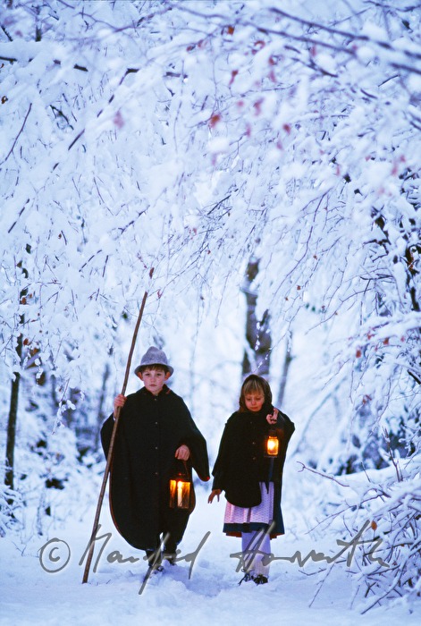boy and girl with lanterns