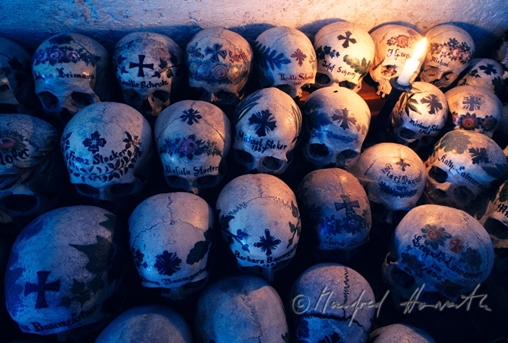painted skulls in the charmel house