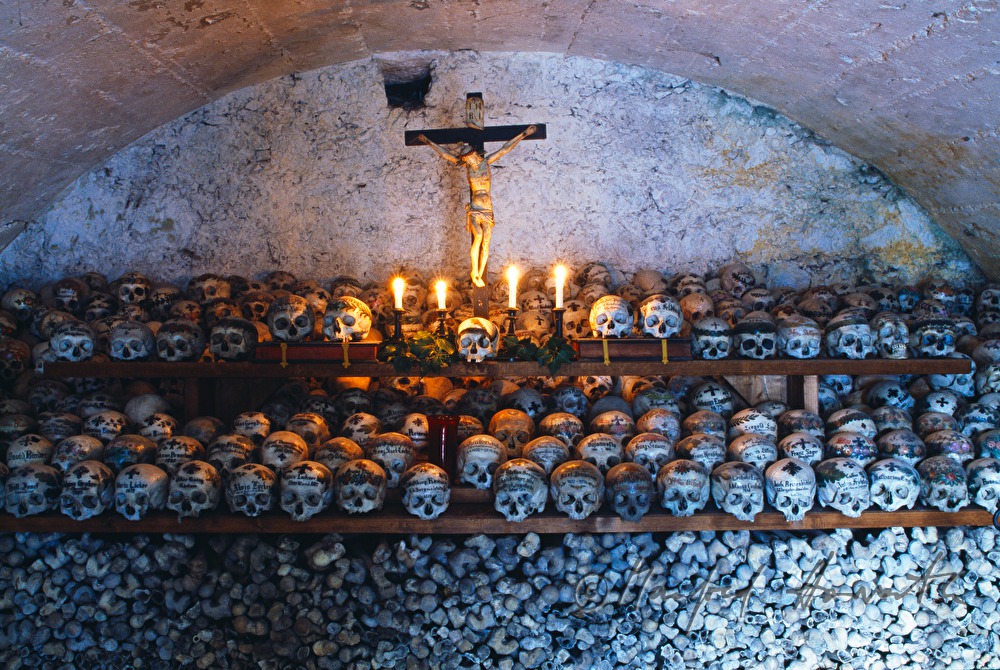 painted skulls in the charmel house