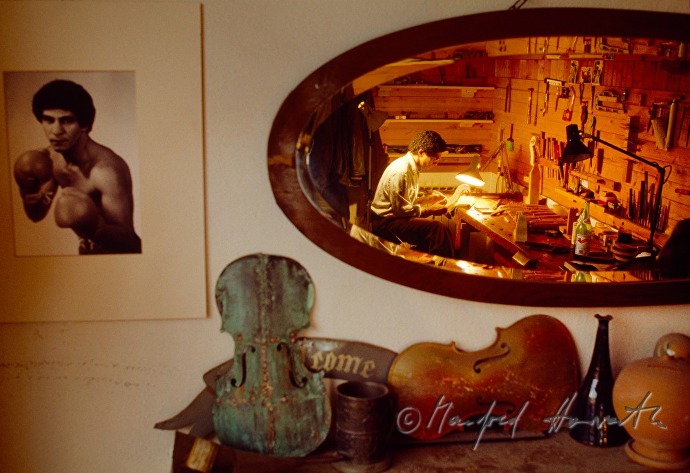 vioin maker in his workshop