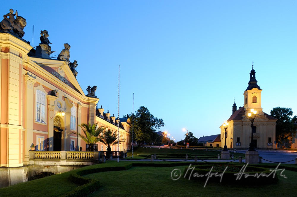 Schloss Dobris, view from the main square with church of Dobris