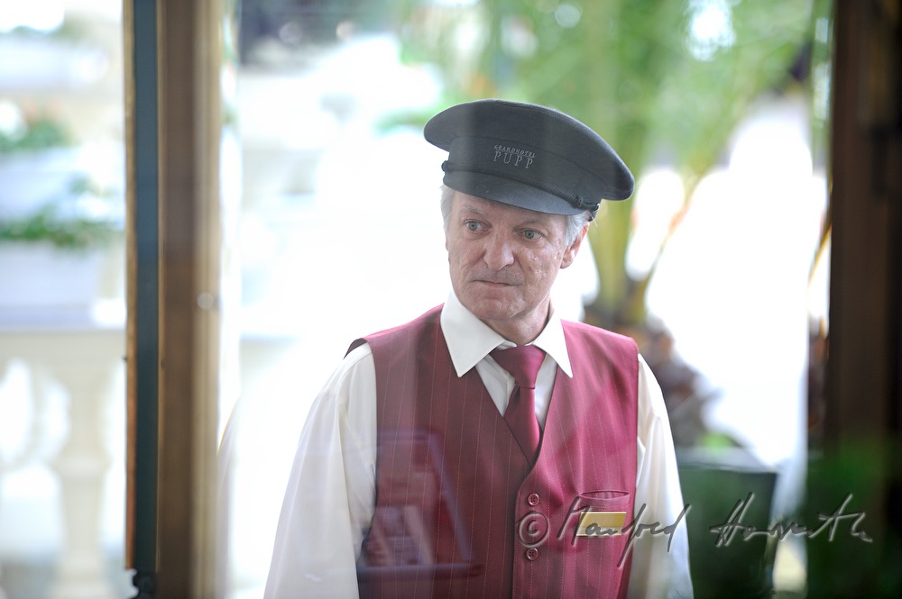 Grandhotel Pupp, uniformed doorman at the main entrance