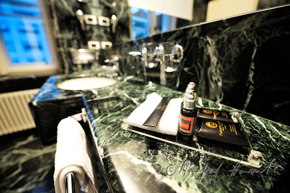 towel, soap and shampoo in the bathroom