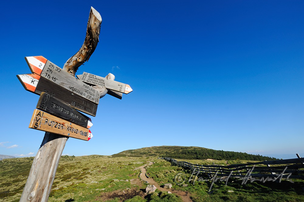 direction sign to the 
