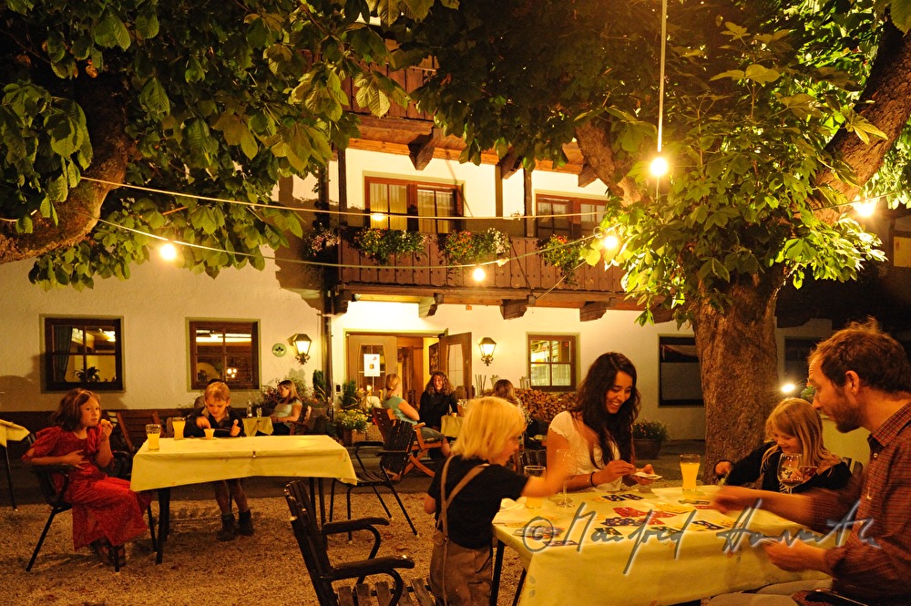 visitors play cards at the Hotel Stern