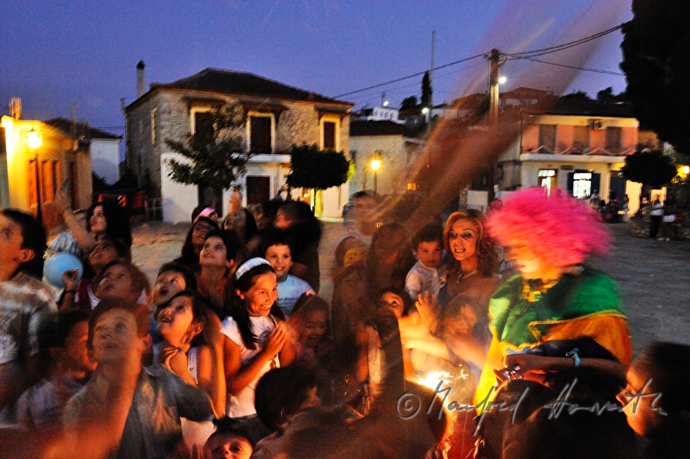 children's party with a clown on the plaza