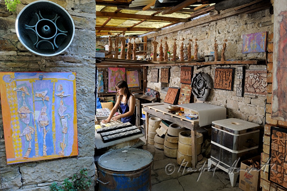 artist in her ceramic studio