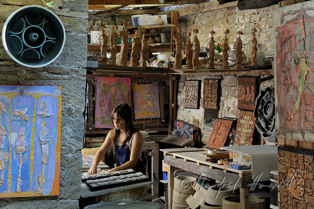 artist in her ceramic studio