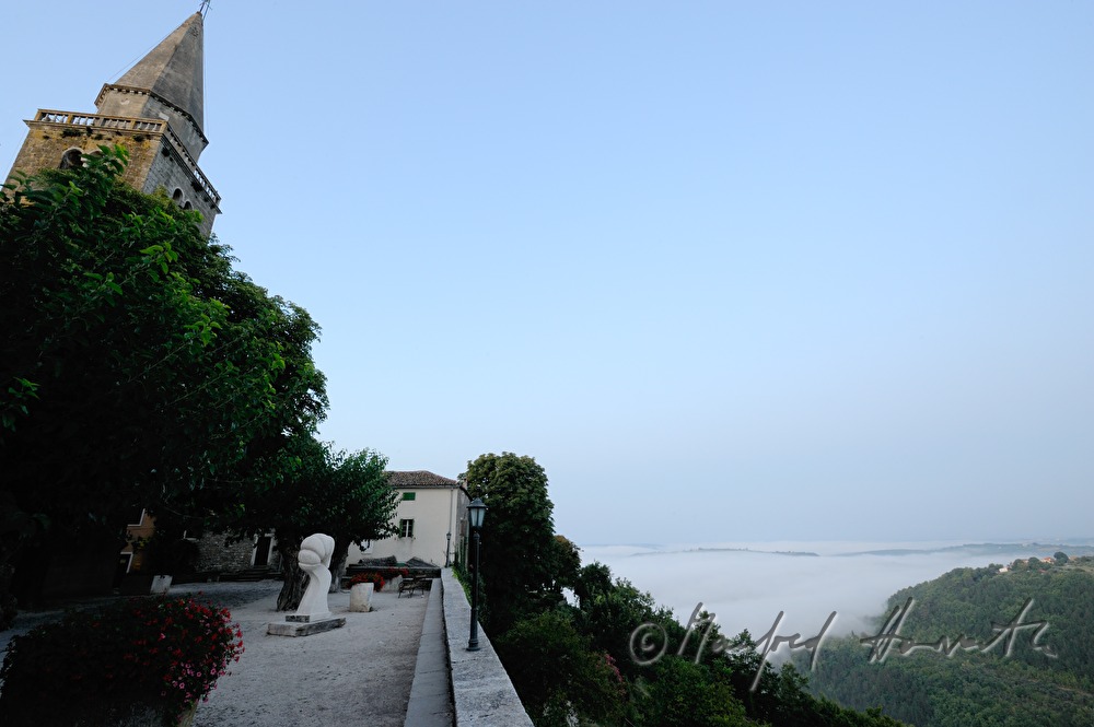 church, city wall  and view to the Mirna Valley