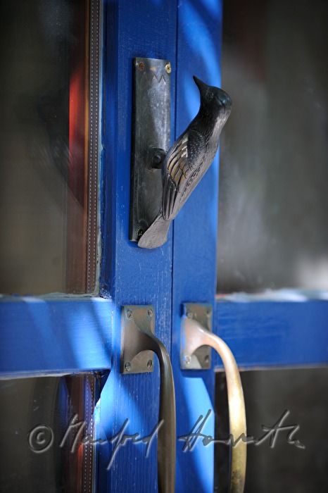 bird functions as a door knob