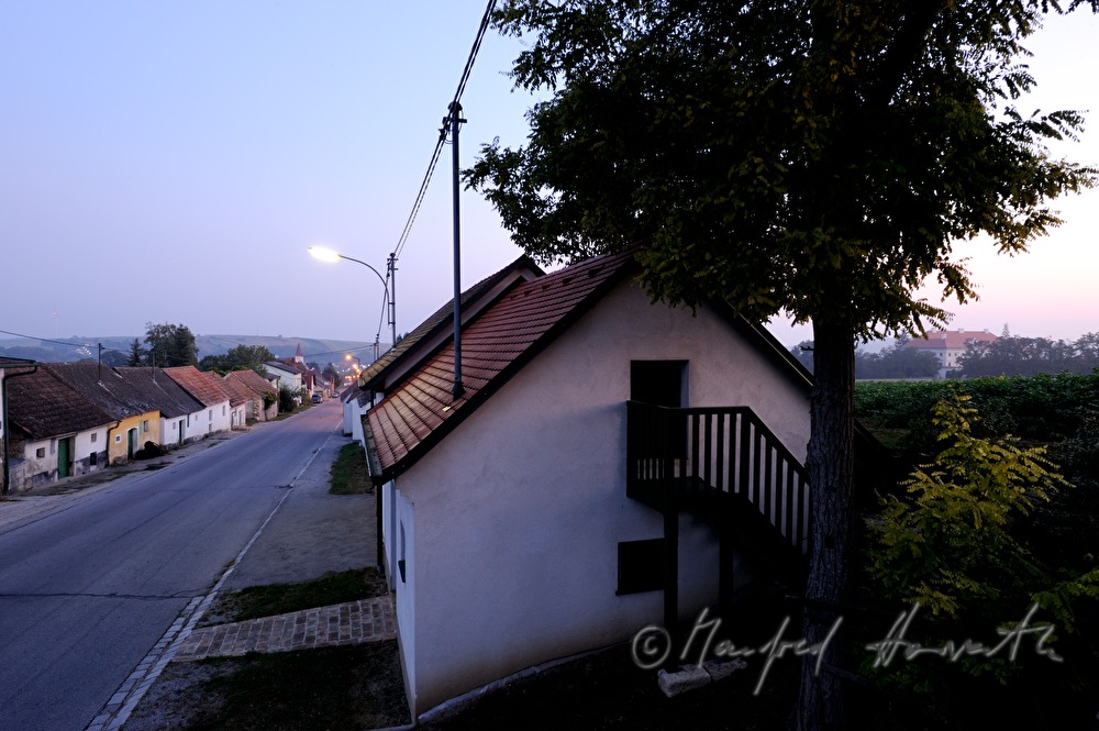 street with typical wine cellars and Castle Prinzendorf