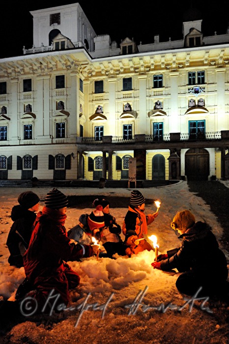 children with torches at the 