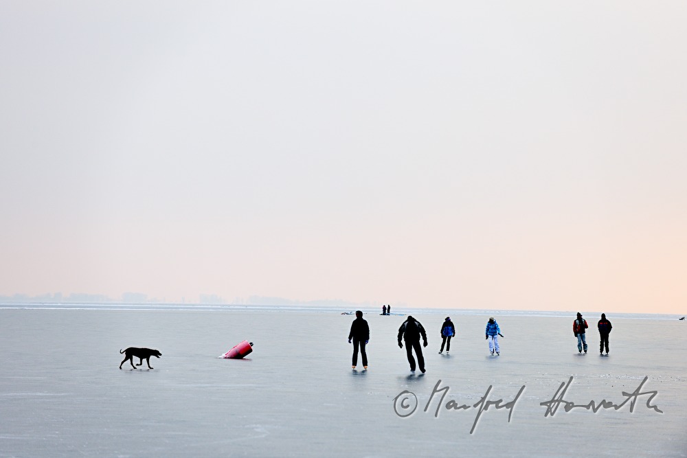 icebound buoys and ice skaters