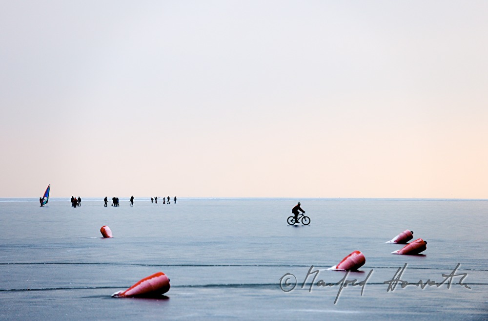 icebound buoys and bicyclist