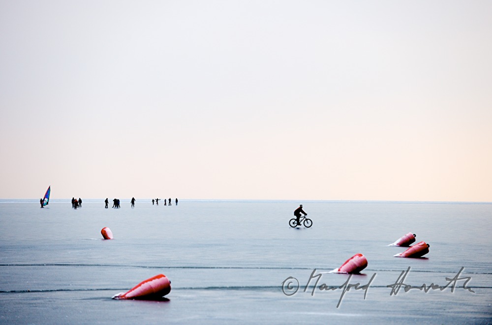 icebound buoys and bicyclist