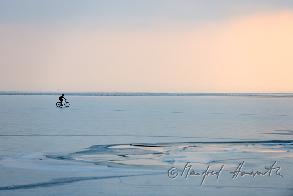 icebound buoys and bicyclist
