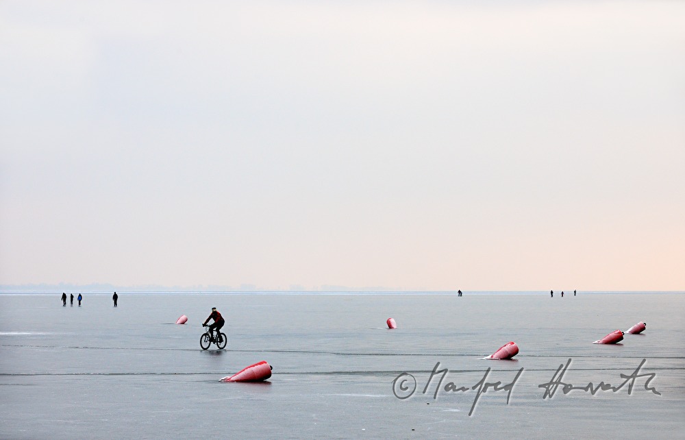icebound buoys and bicyclist