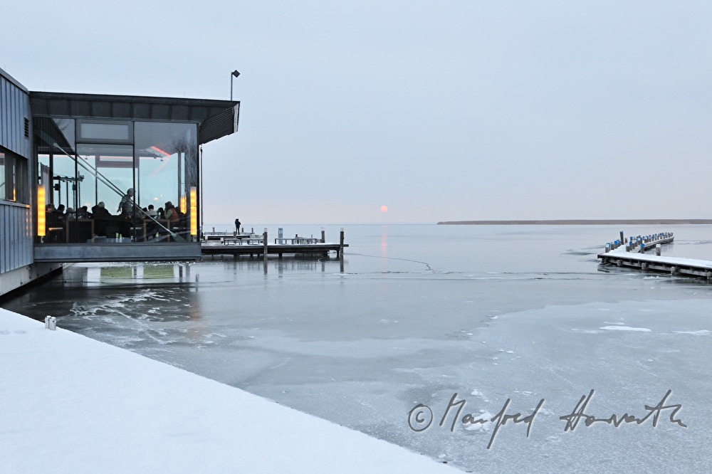 Mole West, and sunset on icecovered lake