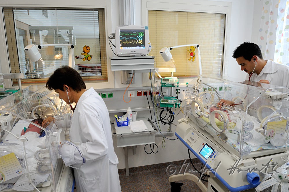 nurse moving child to the play room