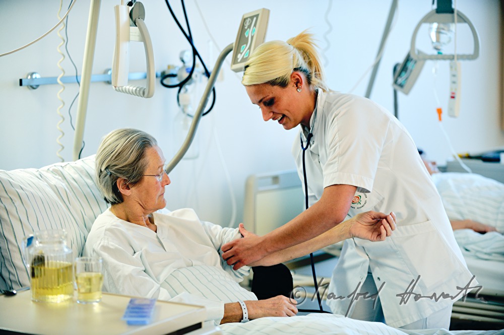 nurse measuring blood pressure
