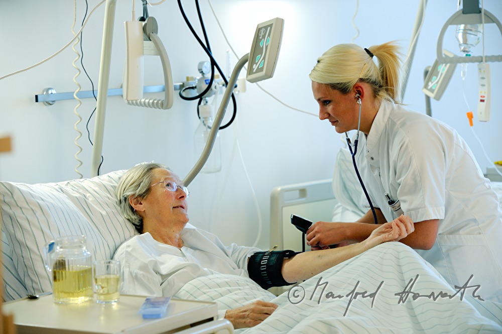 nurse measuring blood pressure