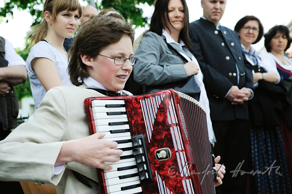 accordeon player at the festival on Whitsuntide