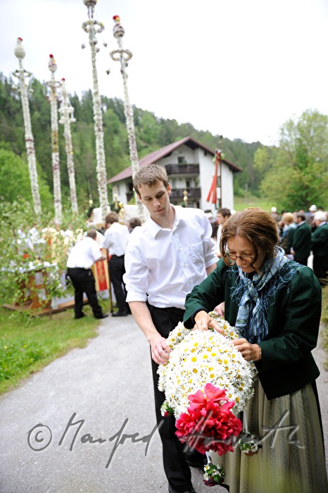Corpus Christi procession with floral decoration