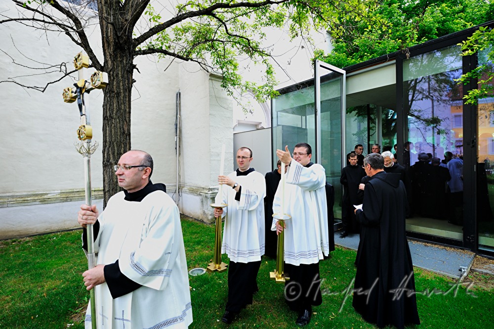 priests at the modern vestry starting a procession