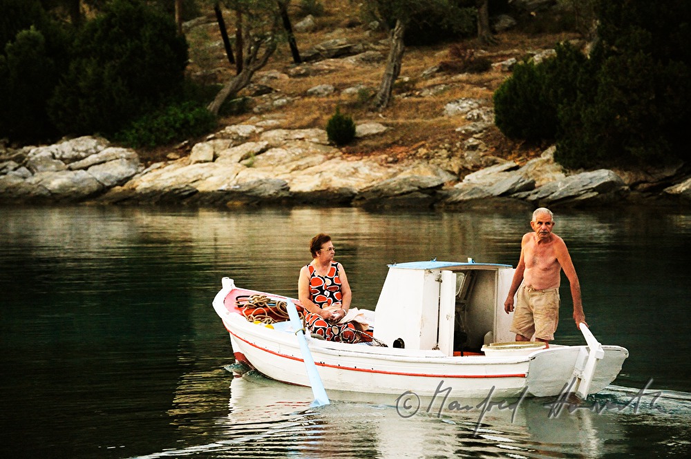 fishing boat wit couple in the harbour