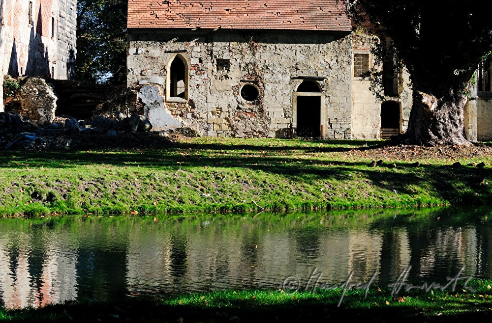 ruinous Castle Pottendorf is set on a lake