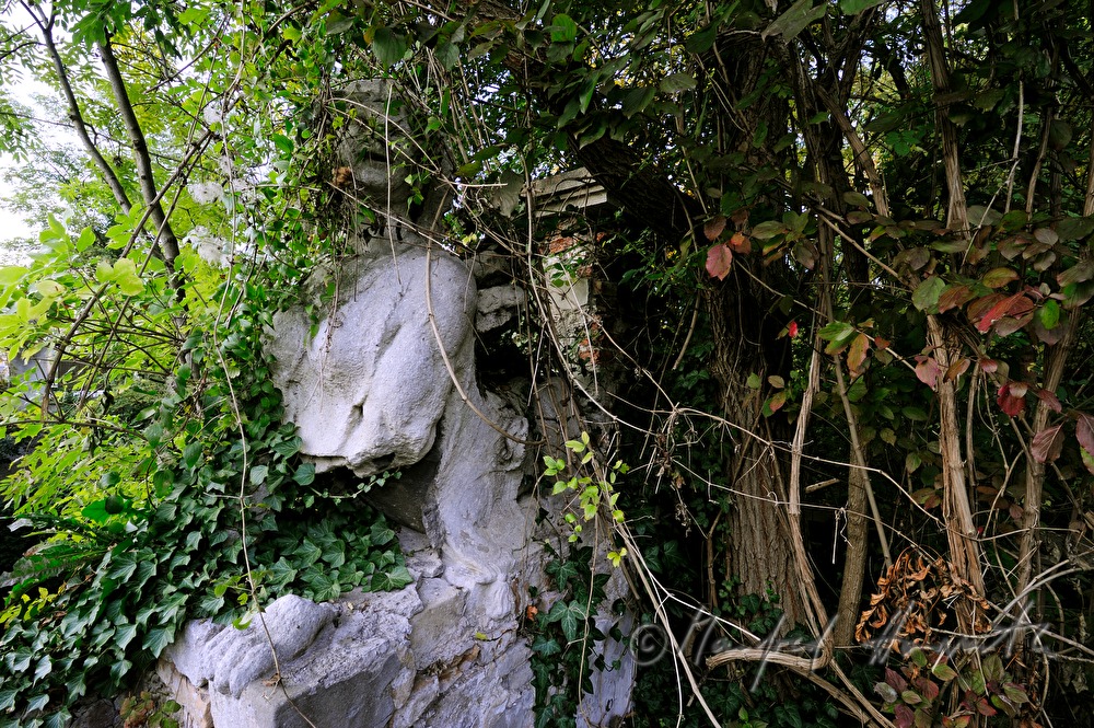 overgrown Sphinx in the garden of the historic paper mill