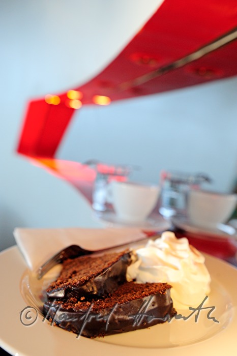 Chocolate-Nut-Cake with whipped cream