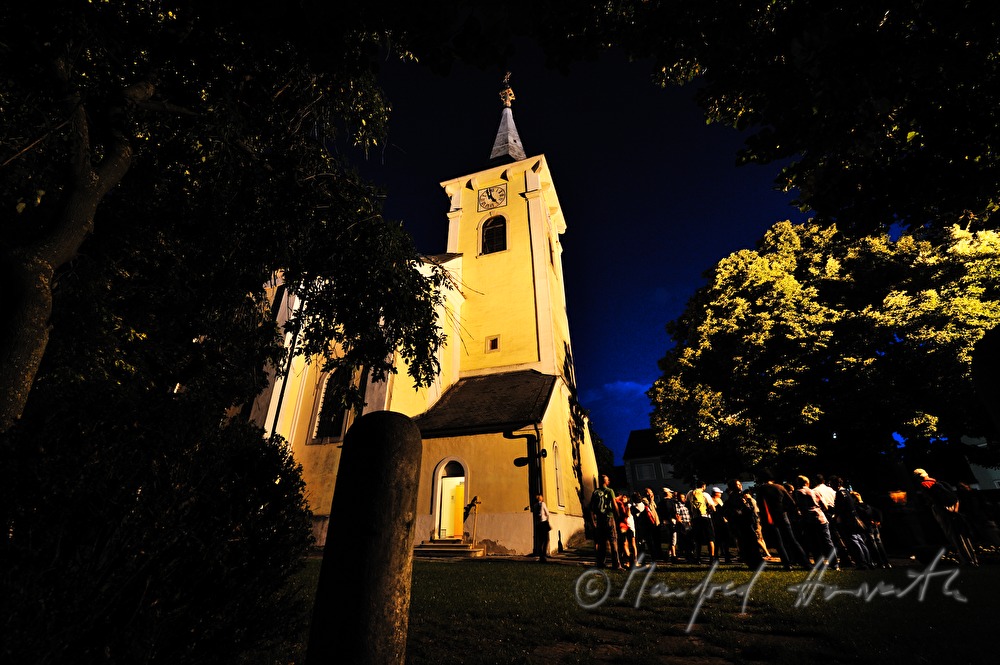 pilgrims in front of the church early in the morning