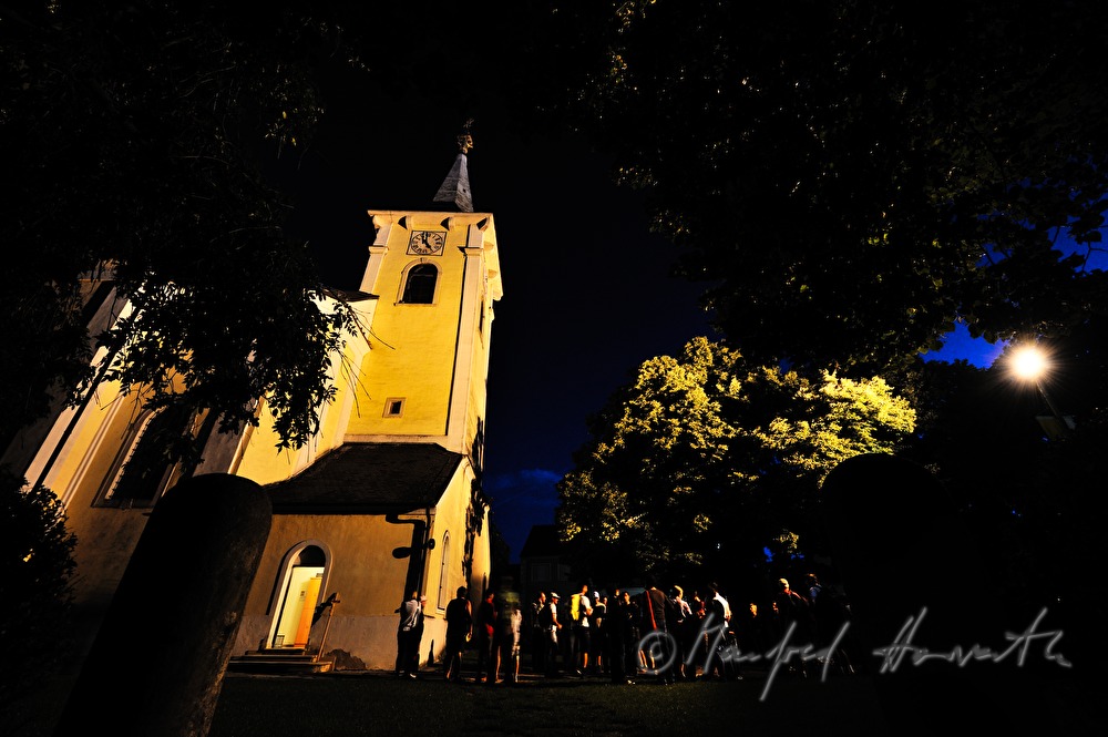 pilgrims in front of the church early in the morning