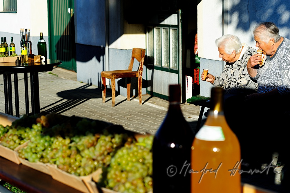 sidewalk sale offers grapes and must