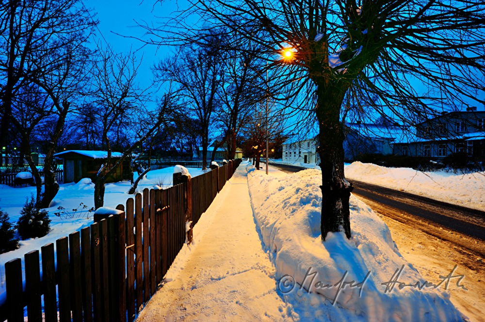 snowcovered pavement and road