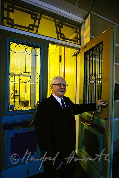 doorman at the entrance of the theater