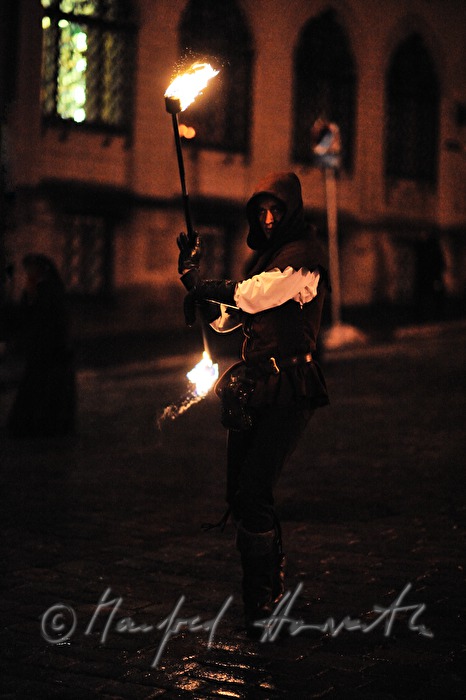 fire-eater during a show on the main square