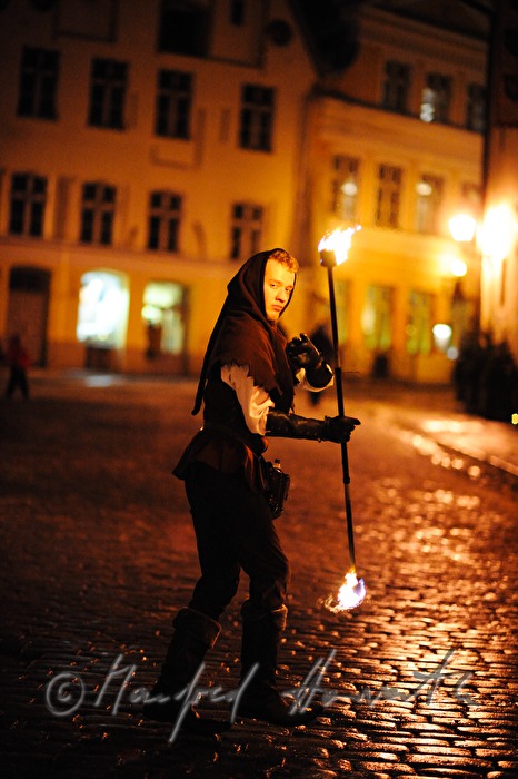 fire-eater during a show on the main square