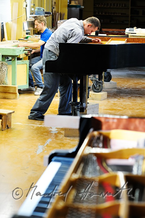 tuning up pianos in the manufacture