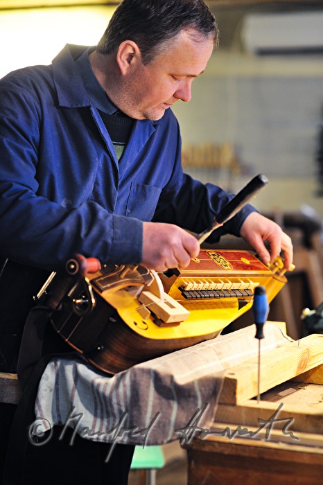 Toomas Marga making hurdy gurdys