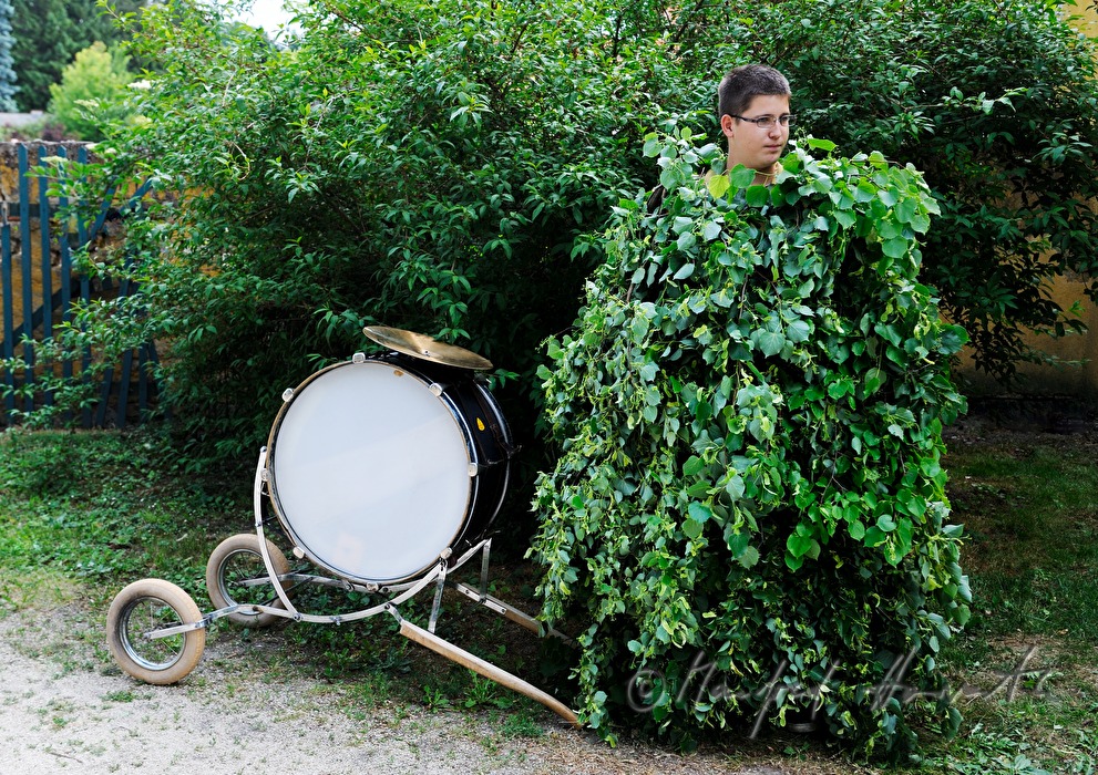 chosen boy in costume of lime tree before the festivity