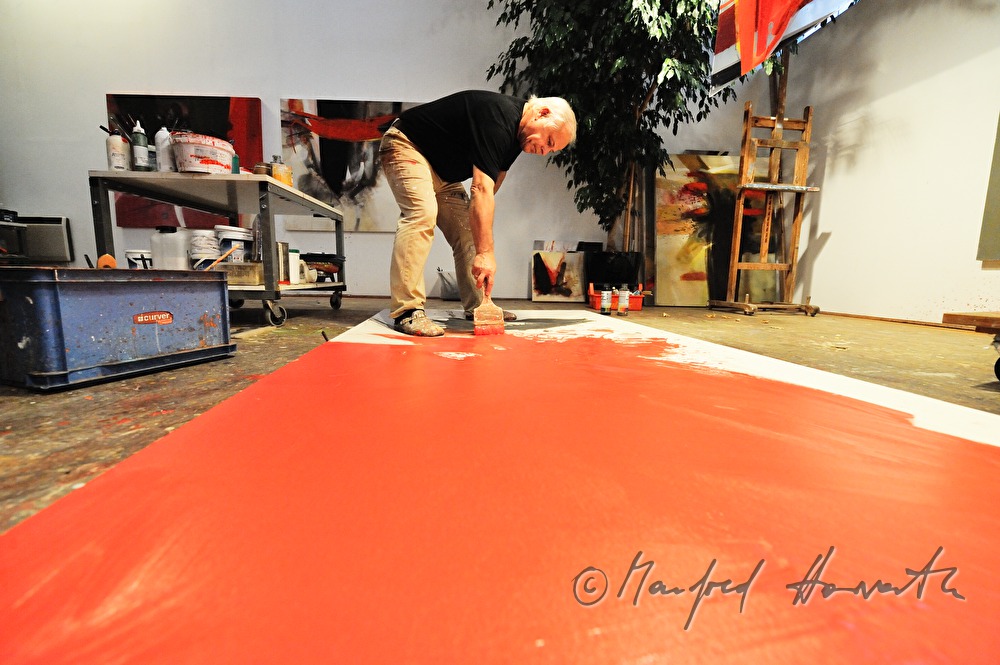 Sepp Laubner painting in his studio