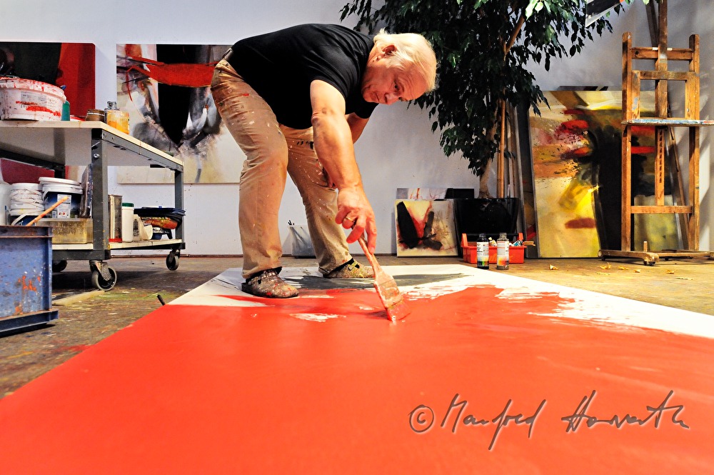 Sepp Laubner painting in his studio