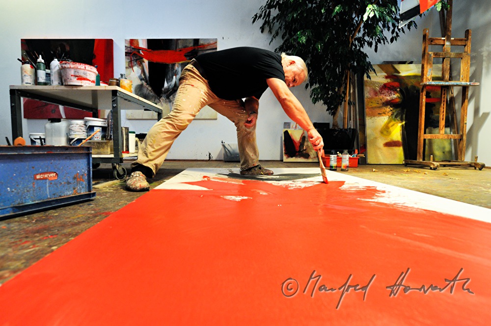 Sepp Laubner painting in his studio