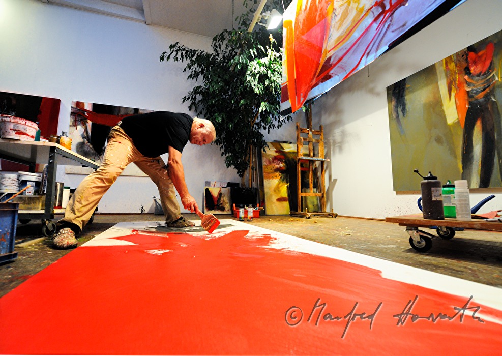 Sepp Laubner painting in his studio